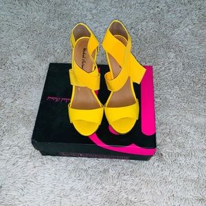 Michael Antonio yellow / mustard platform.